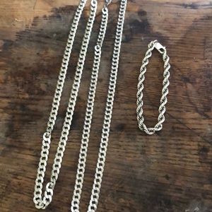Two silver chains and silver rope chain bracelet